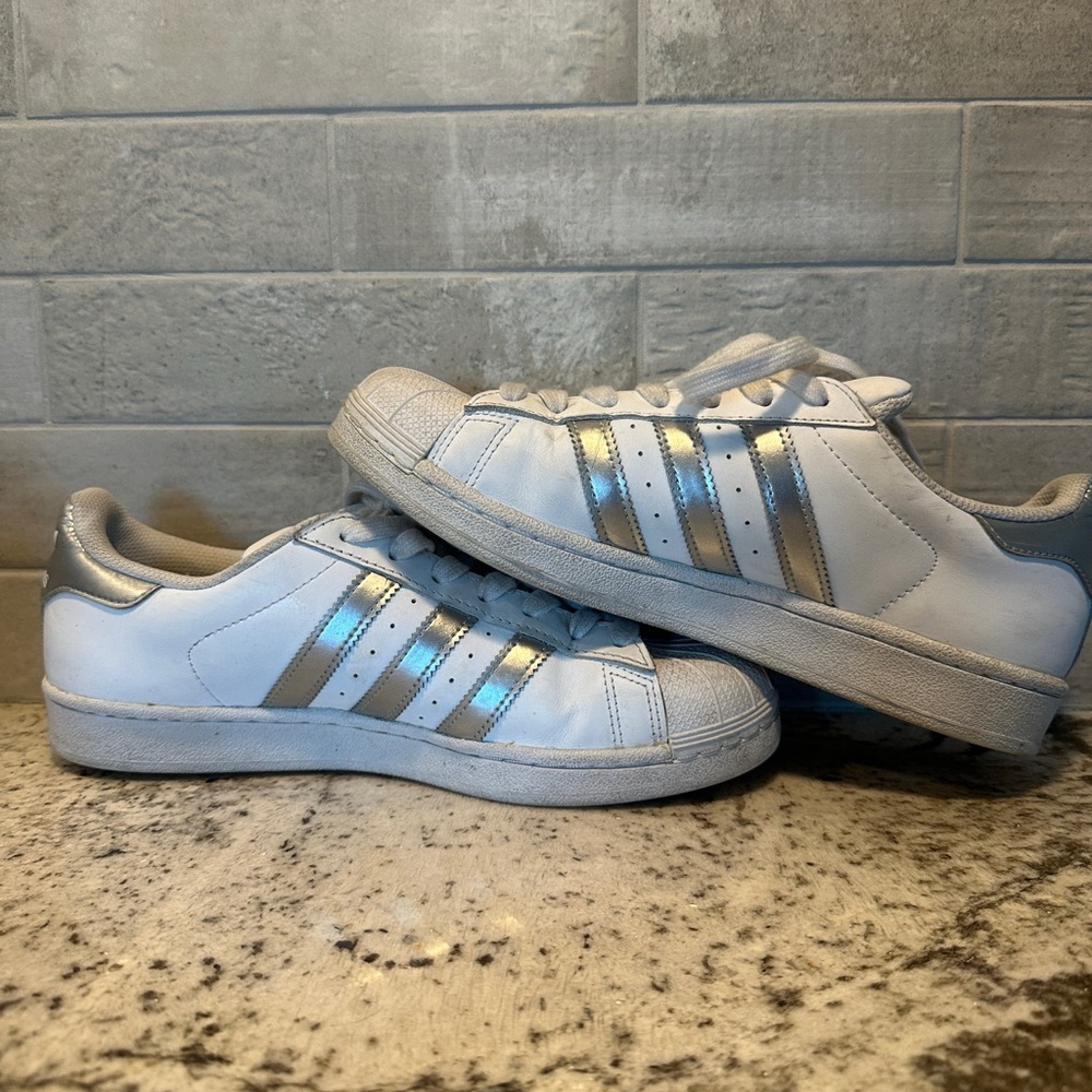 White and silver adidas superstars